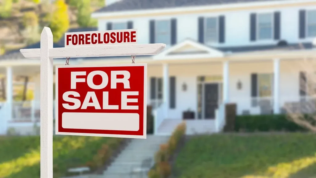 Foreclosure Home For Sale Sign in Front of Large House